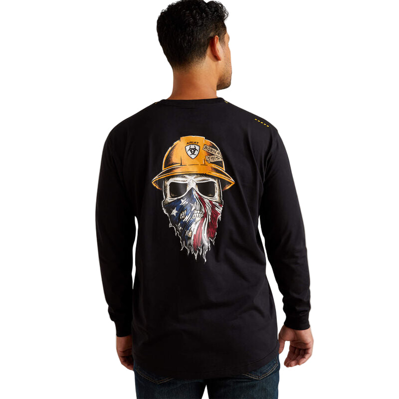Man wearing a black long-sleeve shirt with a graphic design on the back, featuring a helmet and American flag beard.